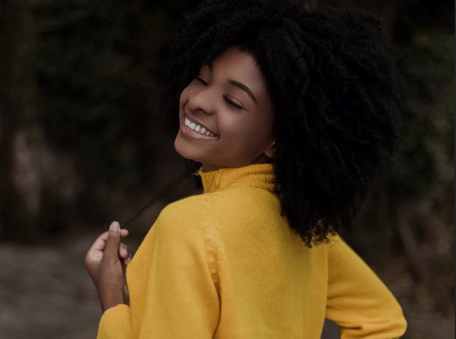 Young woman with long afro hair