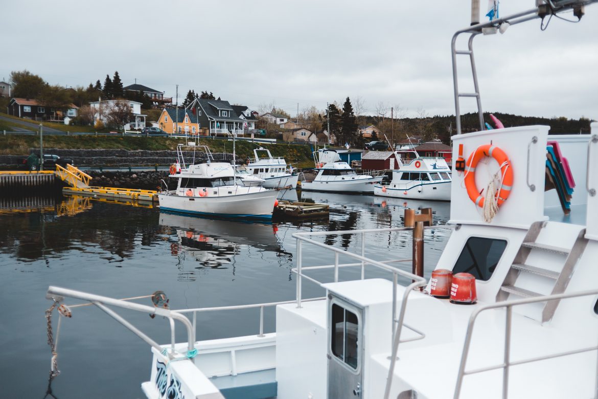 Boats moored on river