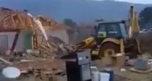 SA woman demolishes family house with TLB after failed marriage
