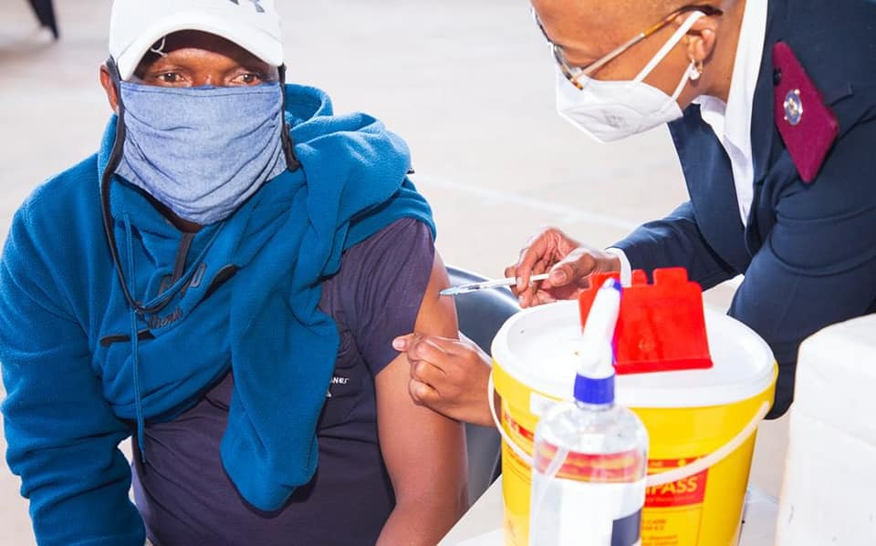 Man getting an injection/ vaccine