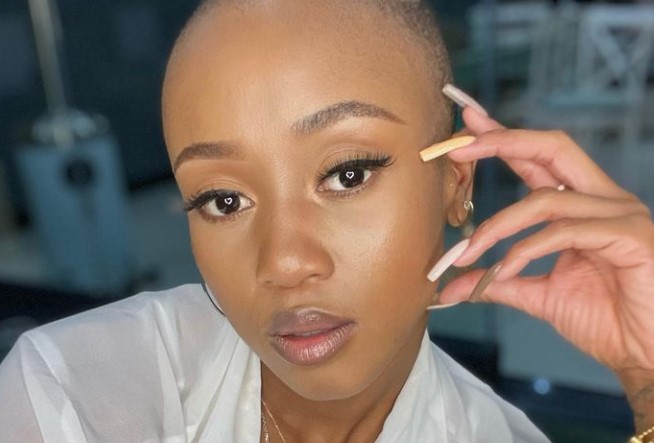 Rapper and TV presenter Moozlie poses for a selfie on Instagram