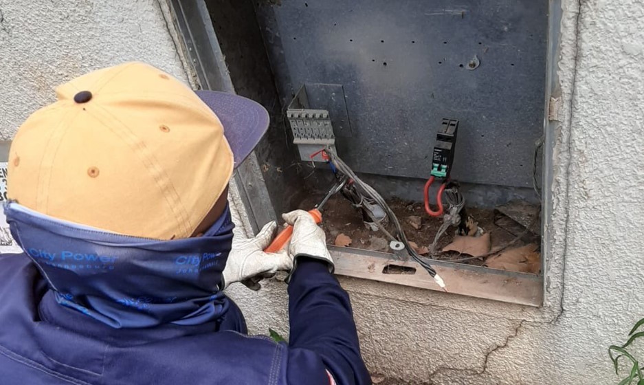 Man working with power cables