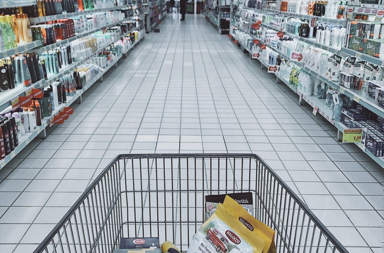 Shopping cart/trolley with groceries at grocery store
