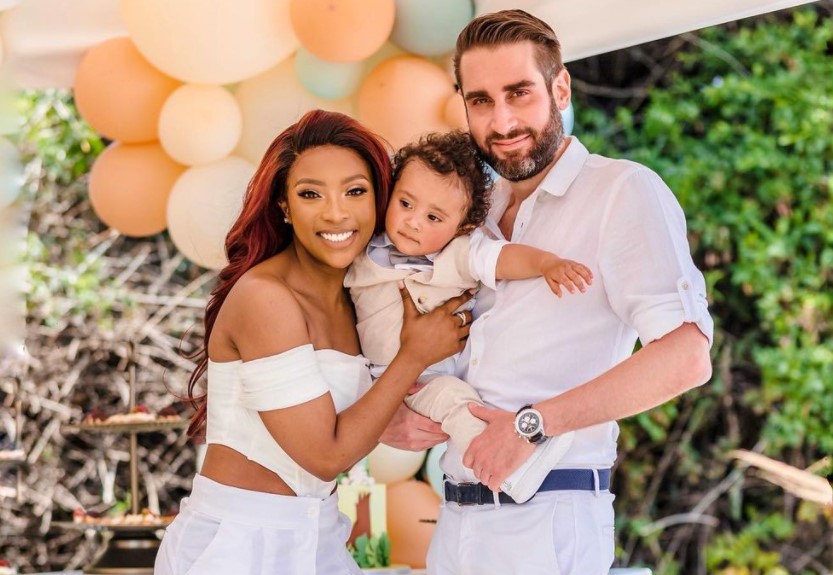 Pearl Modiadie and her partner with their son