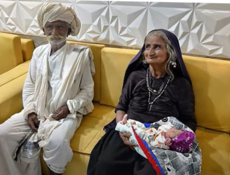 Elderly couple with child/ YouTube screenshot