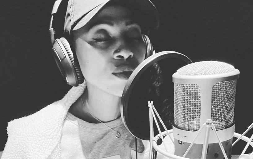 Zonke performing new music, song in studio