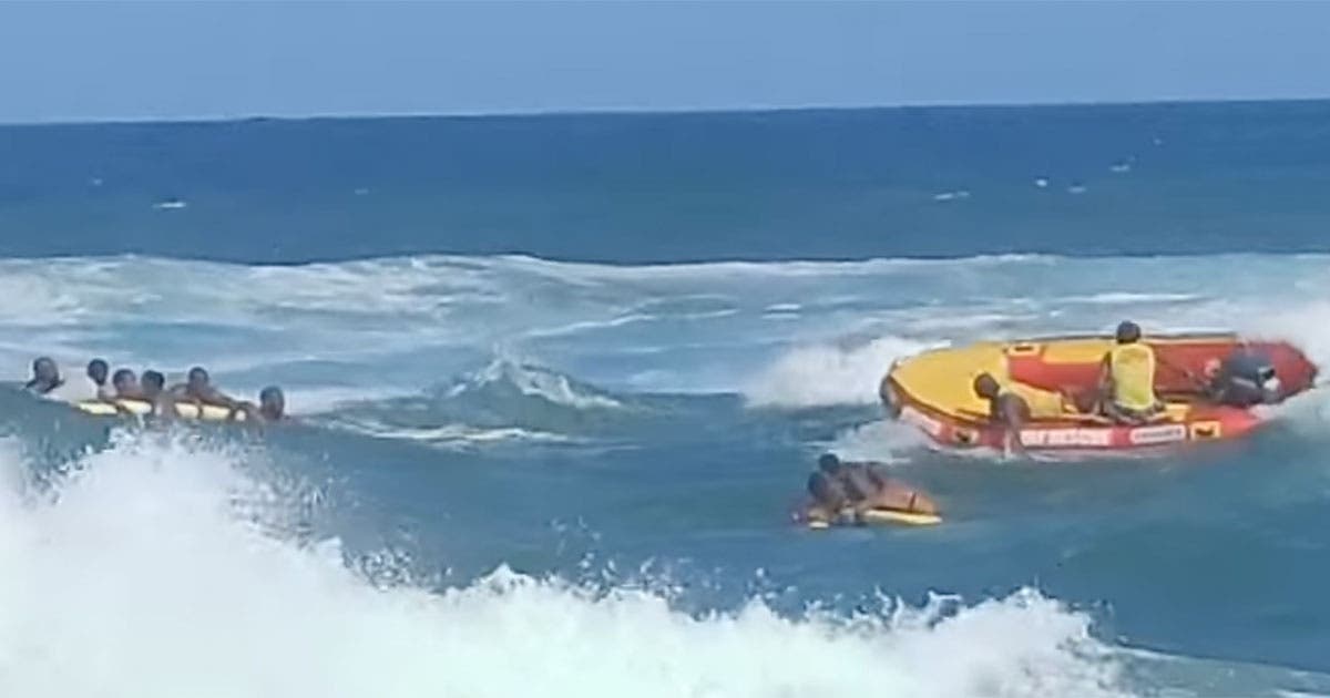 Lifeguards hailed heroes after mass rescue
