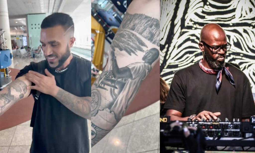 WATCH: Black Coffee reacts to a fan in Barcelona who has a tattoo of him on his arm