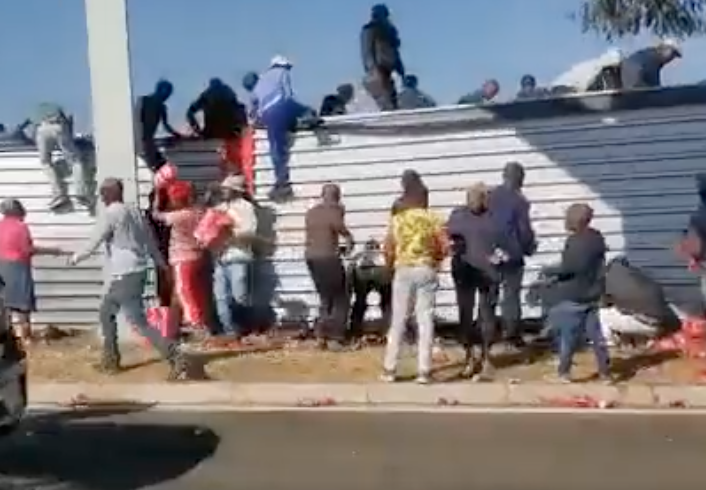 overturned soft drinks truck