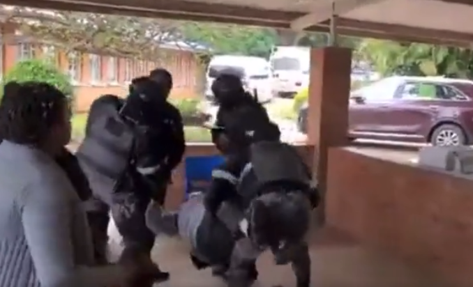 teacher manhandled