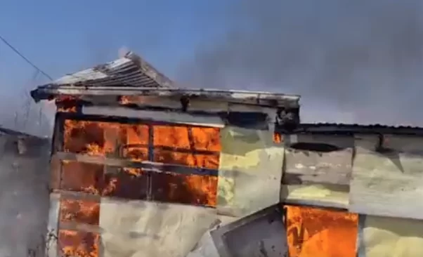 shacks on fire