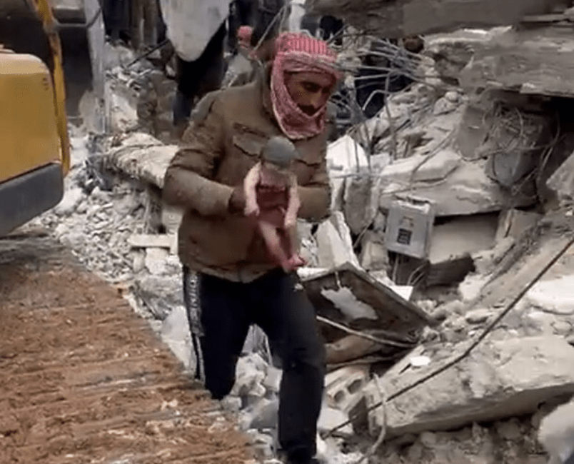 newborn pulled out of rubble