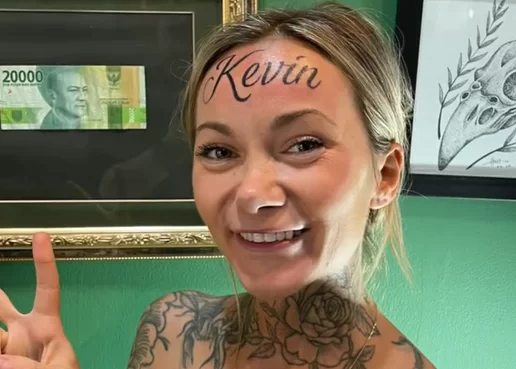 woman tattoos boyfriend's name