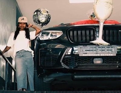 Lady Amar shows off her new ride