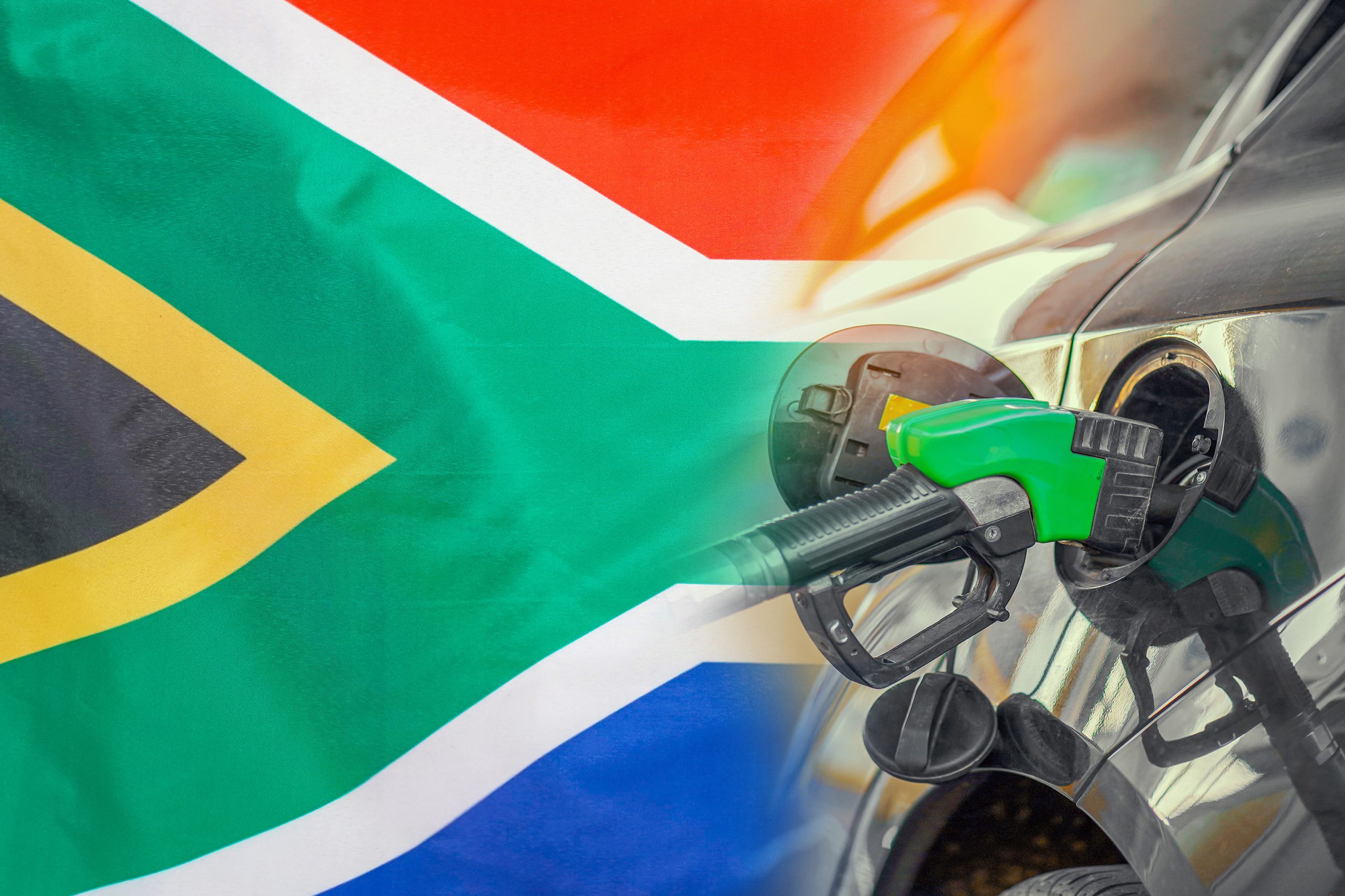 Fuel pump against backdrop of South African flag