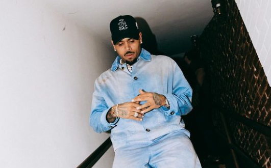 Man reportedly dumps fiancée over picture with Chris Brown