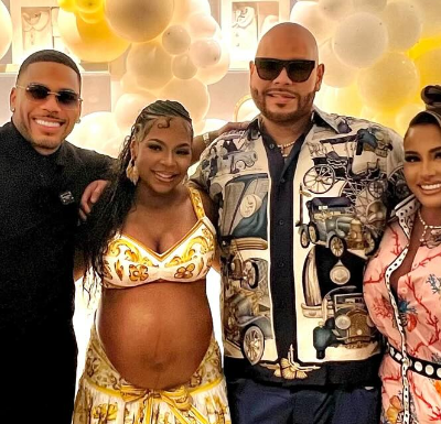 Nelly throws Ashanti surprise baby shower at the Dolce & Gabbana store
