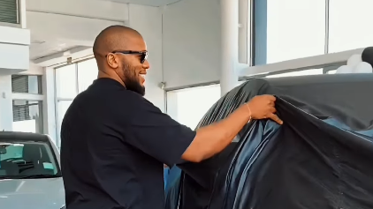 Thembinkosi Mthembu shows off his new luxury SUV