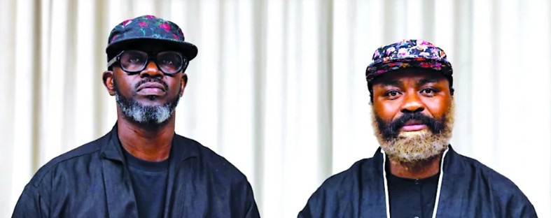 DJ Black Coffee and Nduduzo Makhathini standing side by side