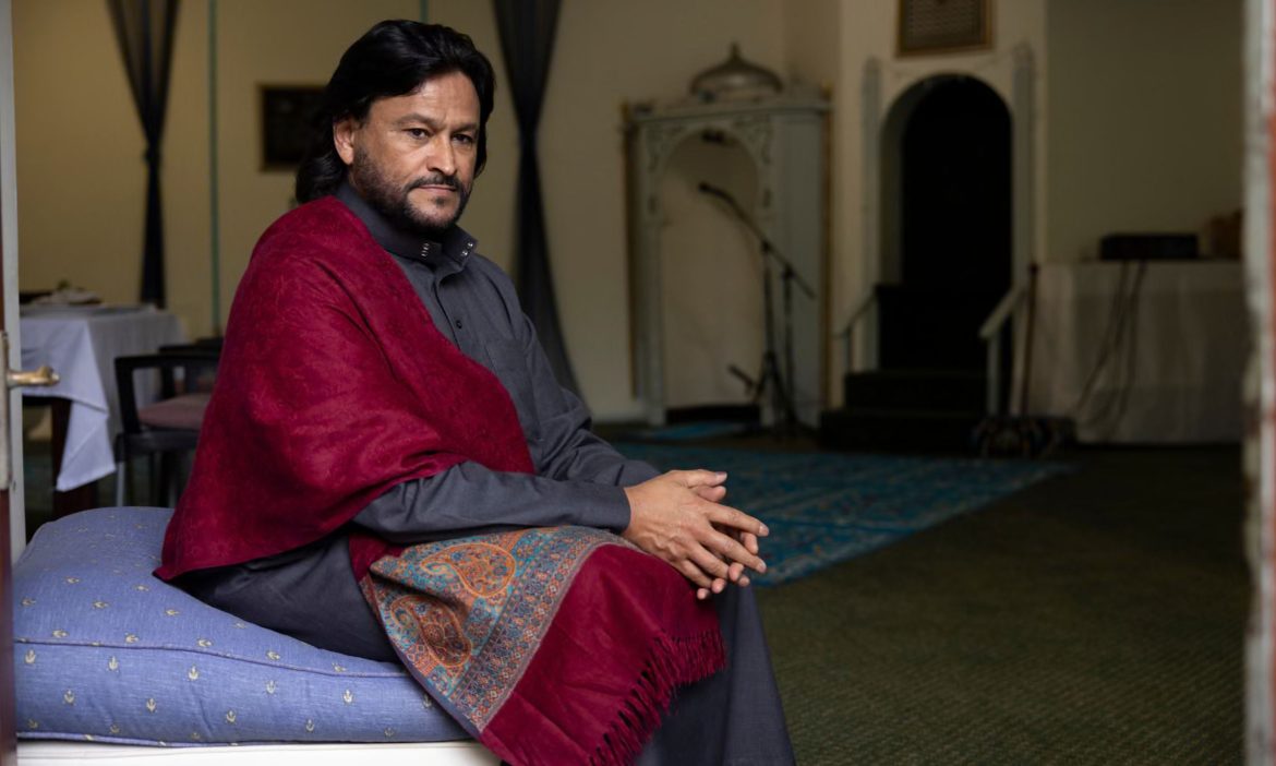 Imam Muhsin Hendricks sitting on a couch