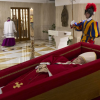 Vatican Releases somber images of Pope Francis lying in a casket