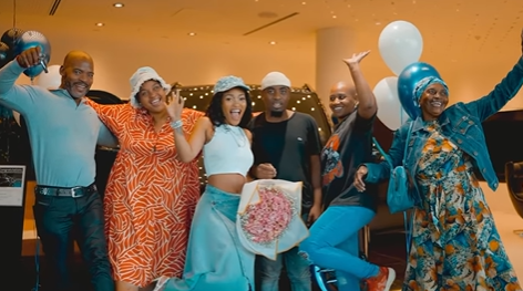 Zee Nxumalo celebrates new car purchase with her family
