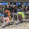 663 Ghanaians return home as immigration deadline nears