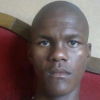 Police hunt for a man accused of hacking three people to death with a spade
