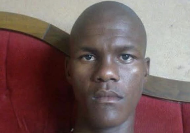 Police hunt for a man accused of hacking three people to death with a spade